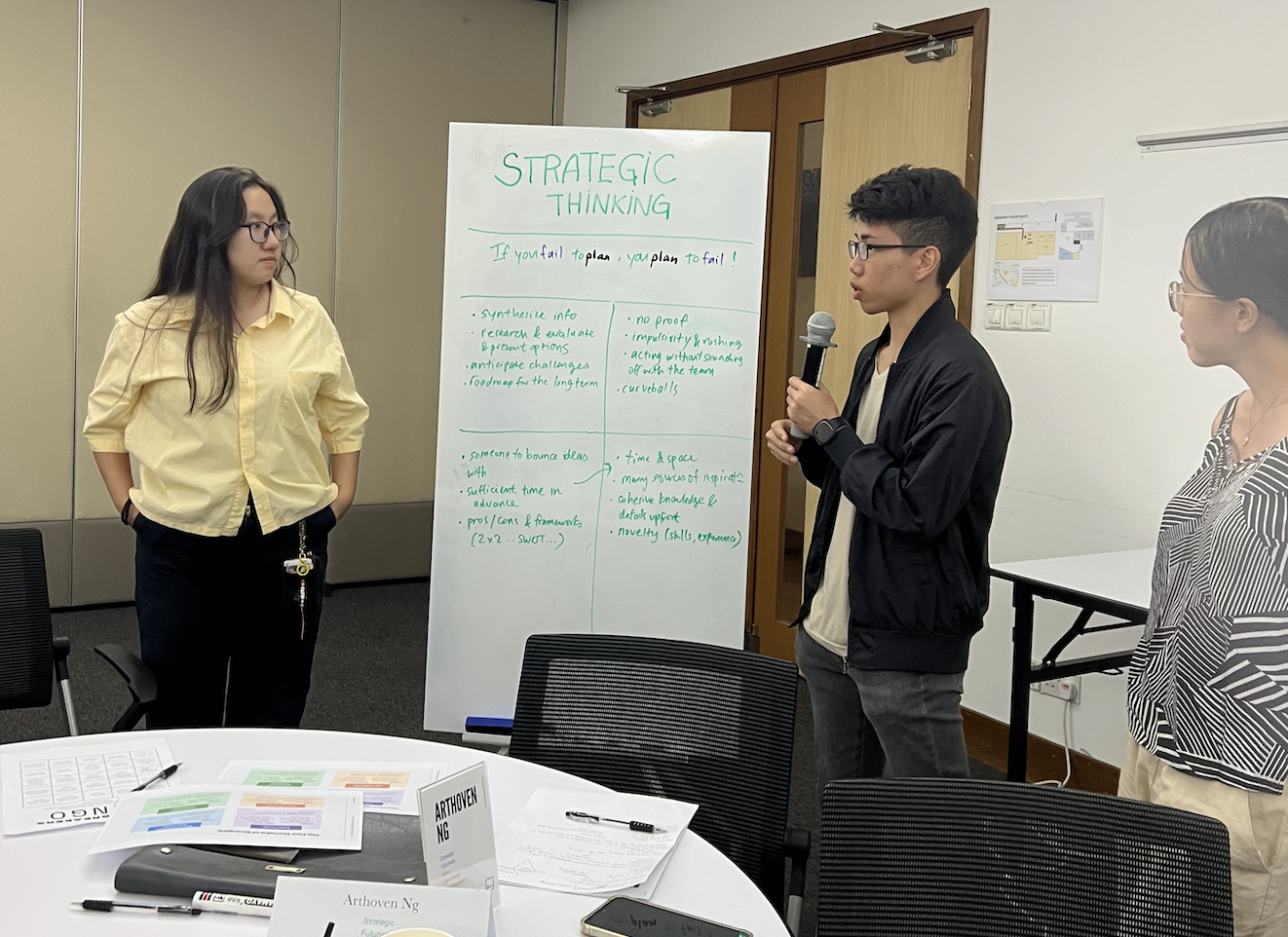 CliftonStrengths workshop in Singapore by The Strengths Co. — mid-career professionals in a small-group strengths-based career development session.